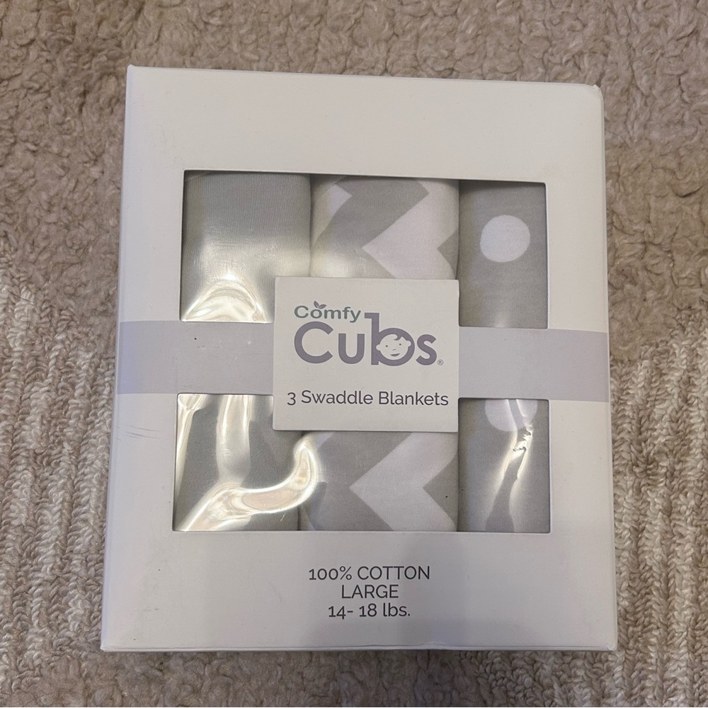 Comfy cubs swaddles-never opened